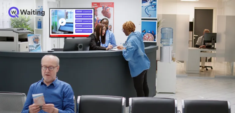 digital screen at reception showing queue status